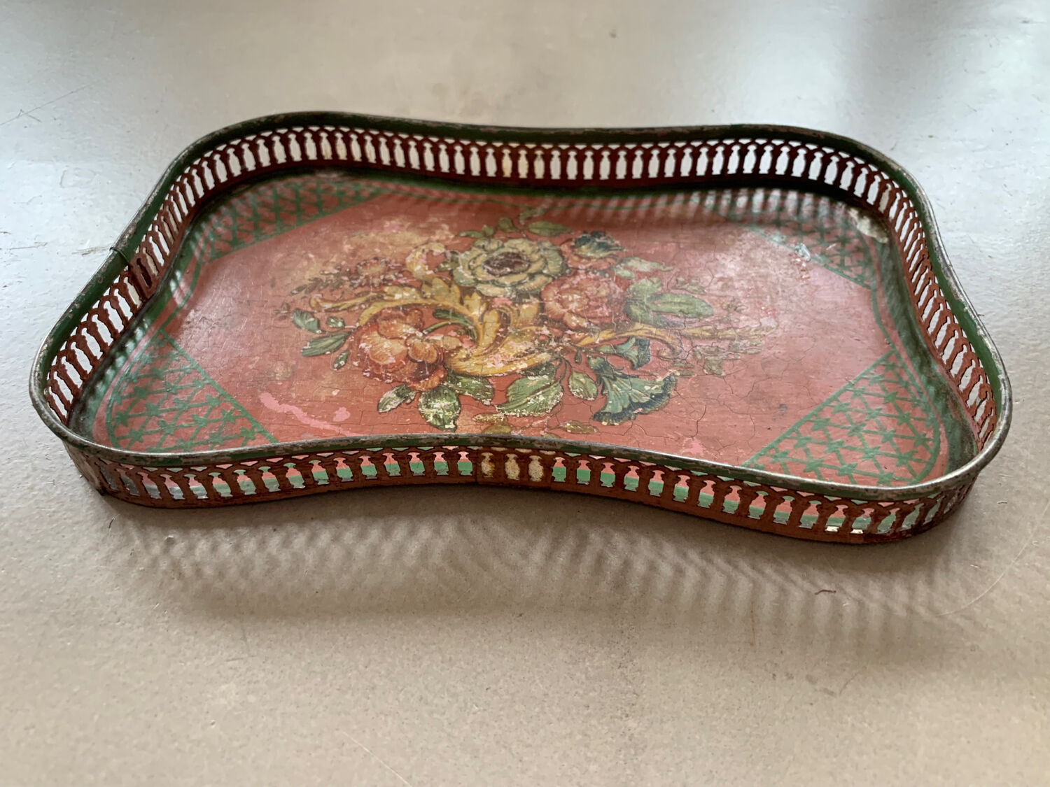 Small decorated tin tray