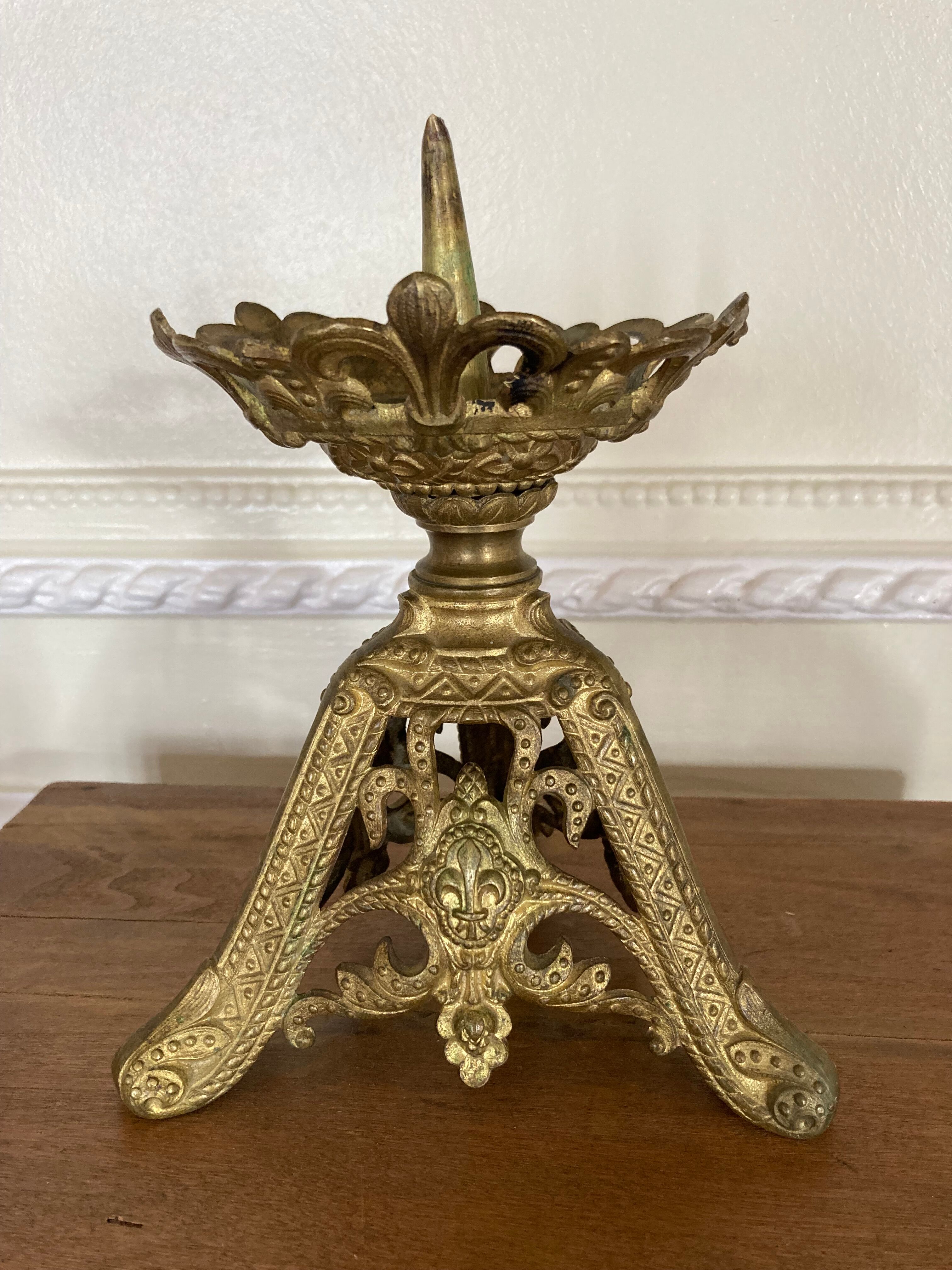 Candle holder church in gilded metal