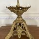 Candle holder church in gilded metal