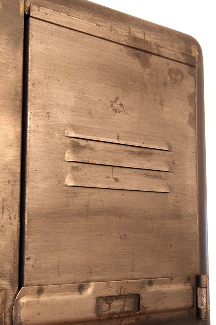 Industrial metal cloakroom with rounded corners.