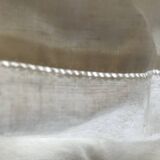 Drap ancien 100% lin. Bordures à bribes brodées. En parfait état.