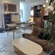 Oval coffee table in raw travertine