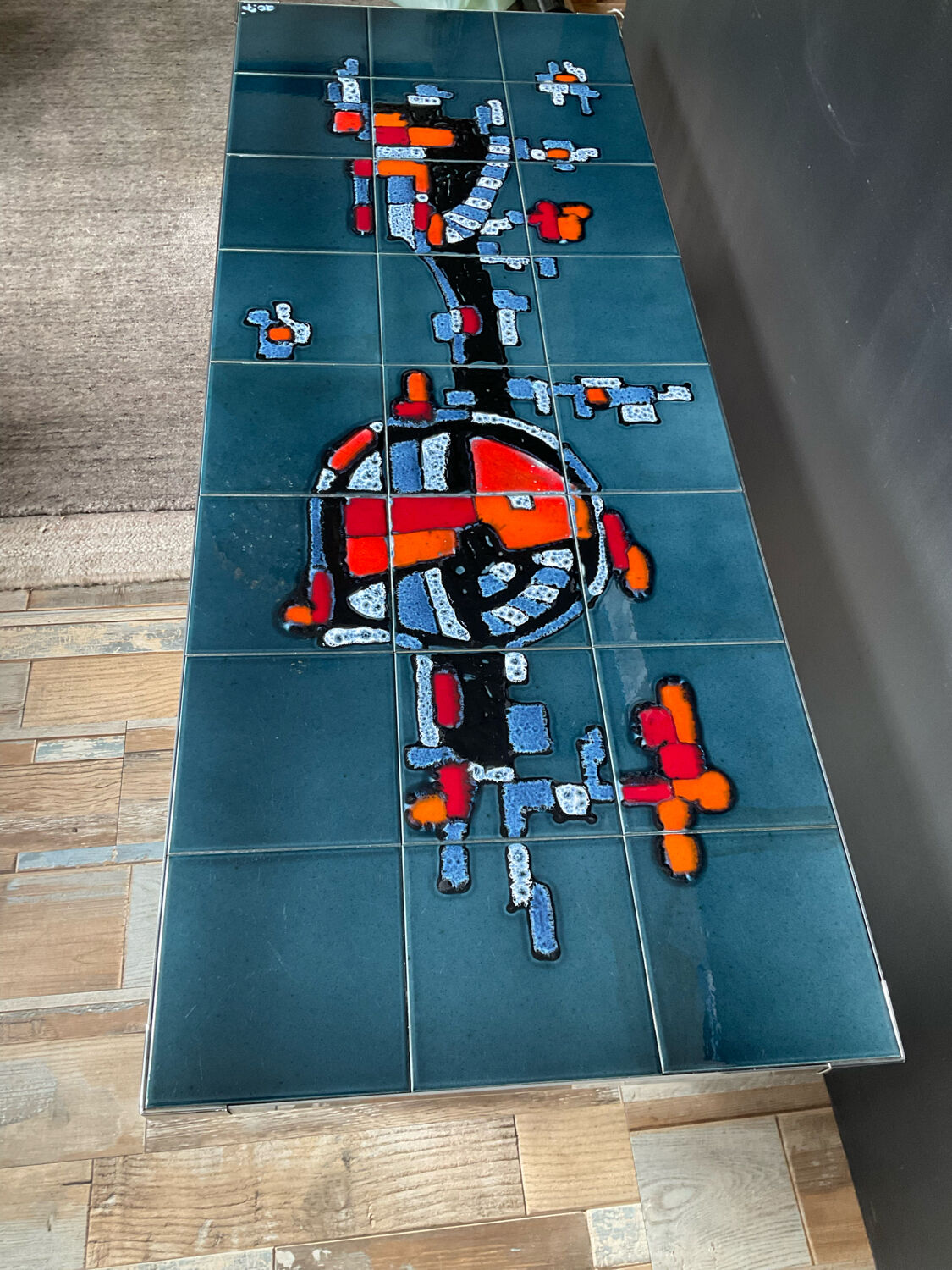 Coffee table in signed ceramic and chromed metal 70s