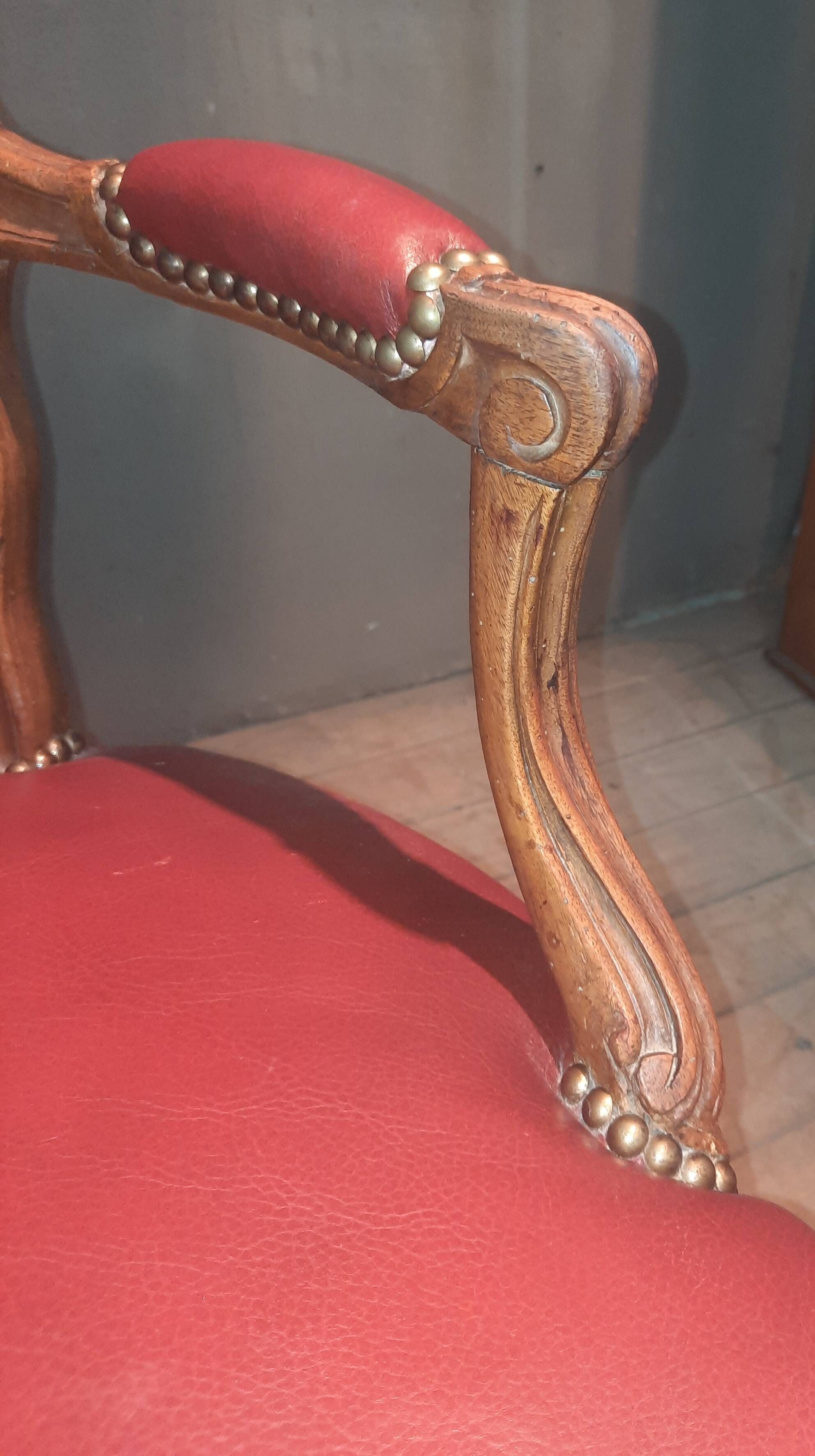 Louis XV period armchair covered in leather.