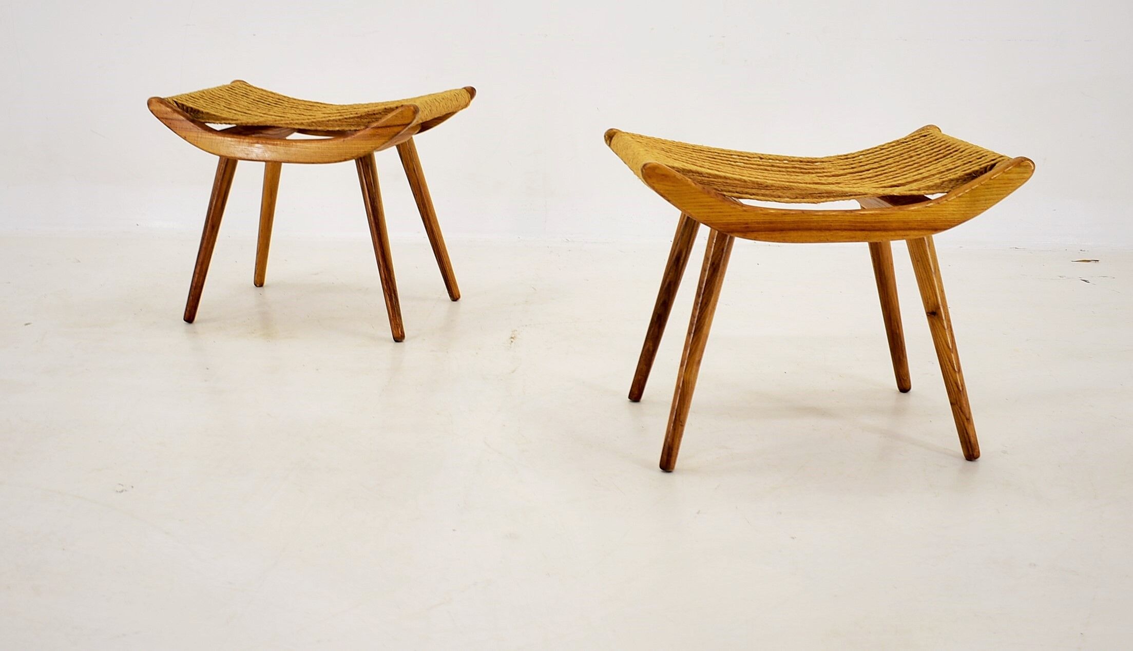 Pair of beech straw stools, 1960s, Czechoslovakia