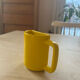 Cup half a cup danish ceramic yellow