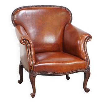 Fauteuil ancien en peau de mouton entièrement restauré