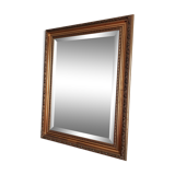Miroir bois sculpté patine doré