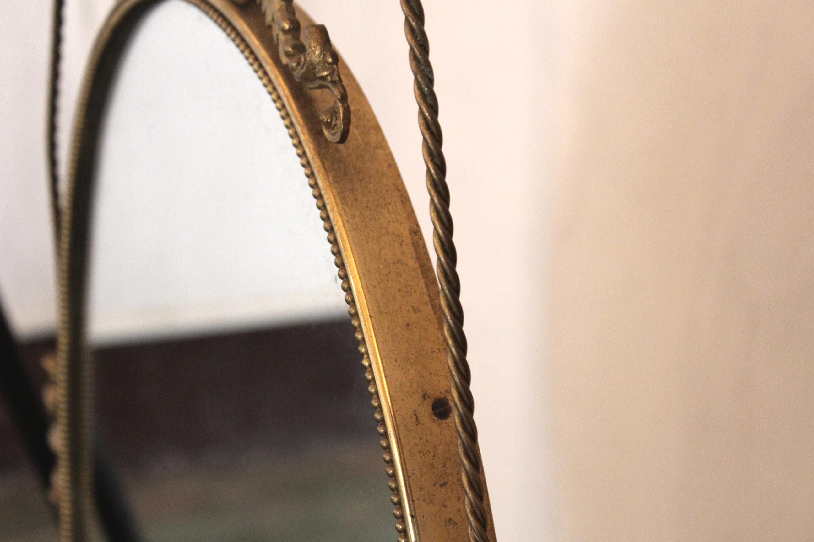 Baroque brass wall mirror, 1930s