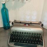Machine à ecrire remington portable 50's  portable avec sa boite originale coloris gris