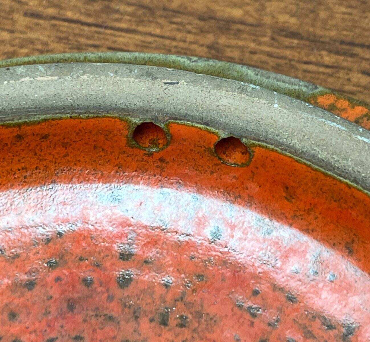 Mid-century modern Danish studio pottery, orange wall coat rack by Signe Boesen Northroup, 1960s.