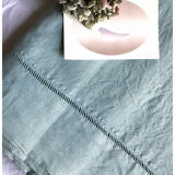 Old sheet in pure washed linen tinted in celadon green