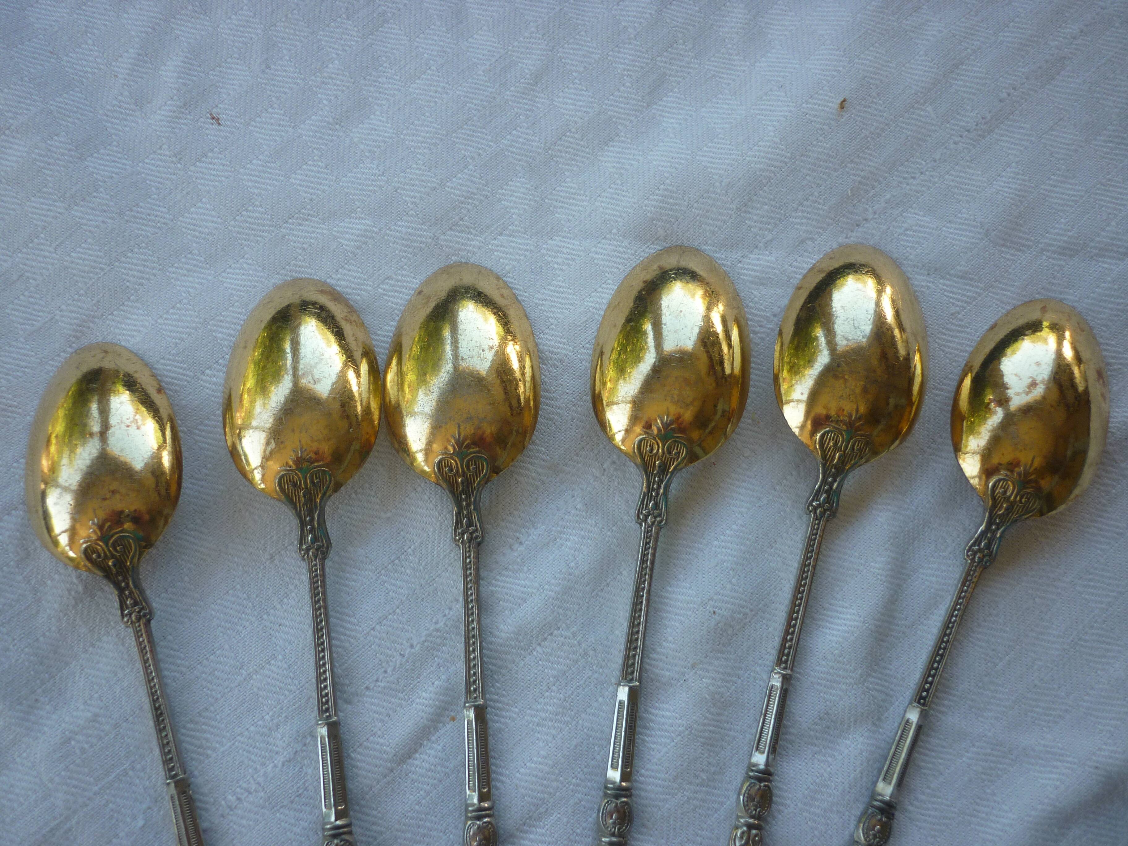 6 spoonfuls of silver and gold metal coffee
