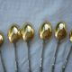 6 spoonfuls of silver and gold metal coffee