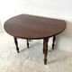 Table en acajou extensible 4 rallonges fournies
