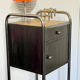 Vintage bedside table in brushed metal