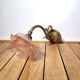 Old pink and golden brass wall lamp
