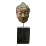 Buddha head sculpture, marble base