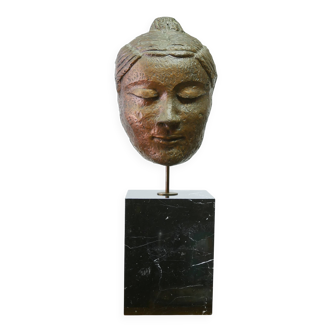 Buddha head sculpture, marble base