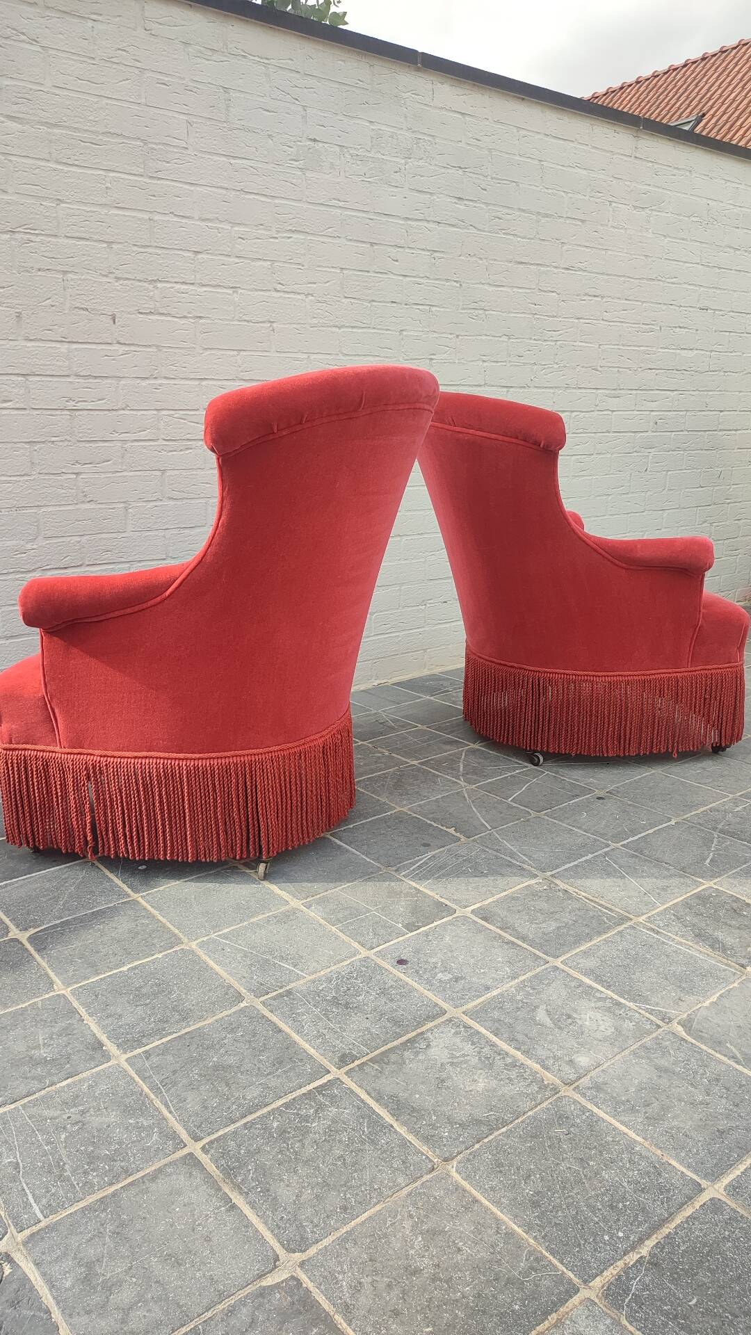 Pair of fringed crapaud armchairs