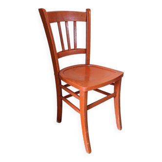 Ancienne chaise de bistrot orange