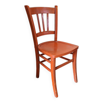 Old orange bistro chair