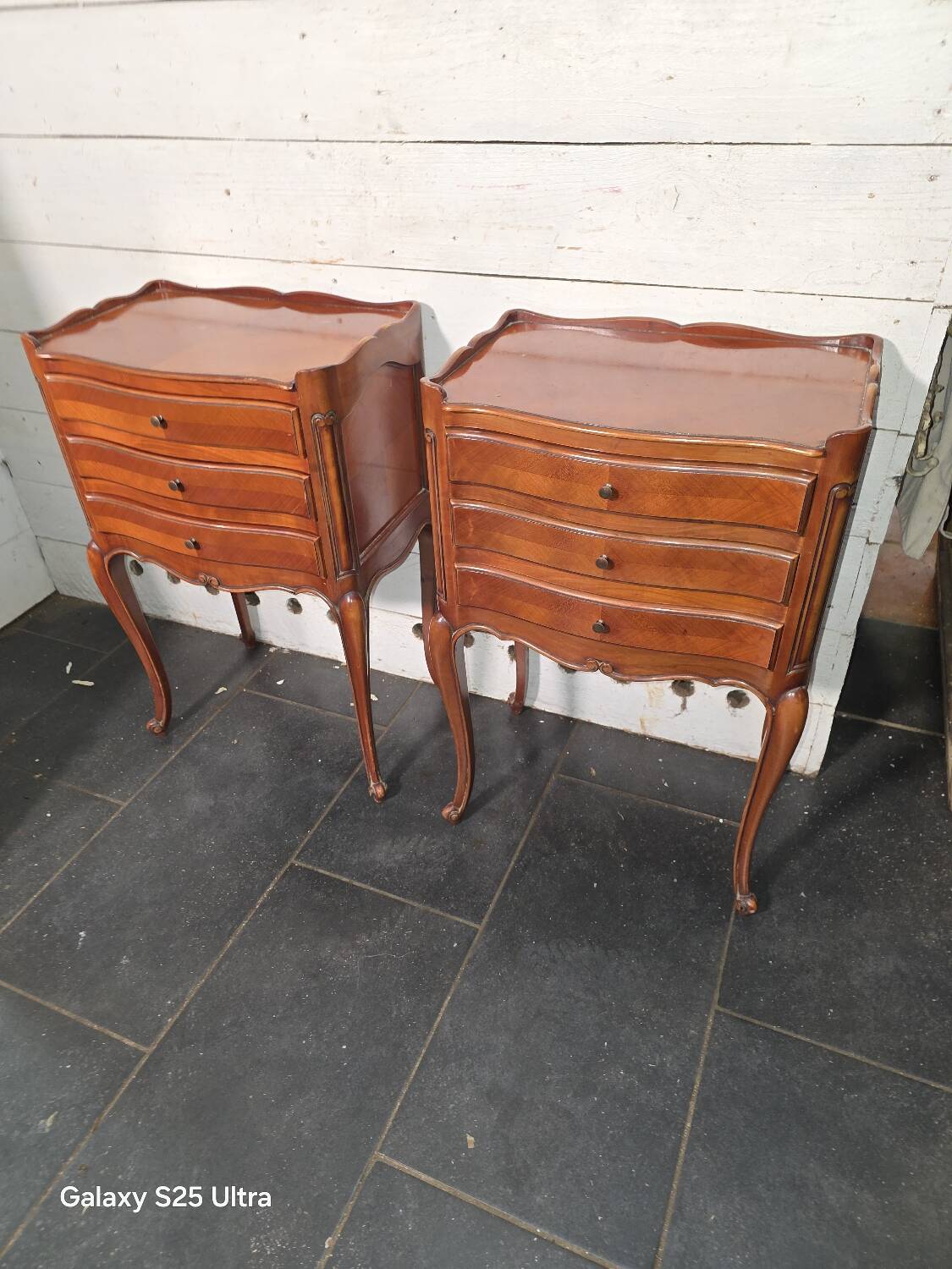 Pair of Louis XV style bedside tables in cherry wood marquetry.