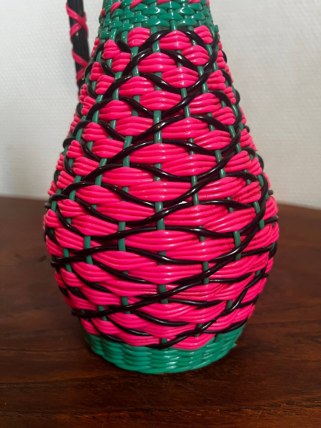 Old glass bottle and scoubidou