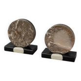Vintage pair of bookends in fossilised coral agate | Stone disc-shaped bookends on a black marble base