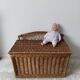 Old toy box in rattan, wicker, bench, end of bed