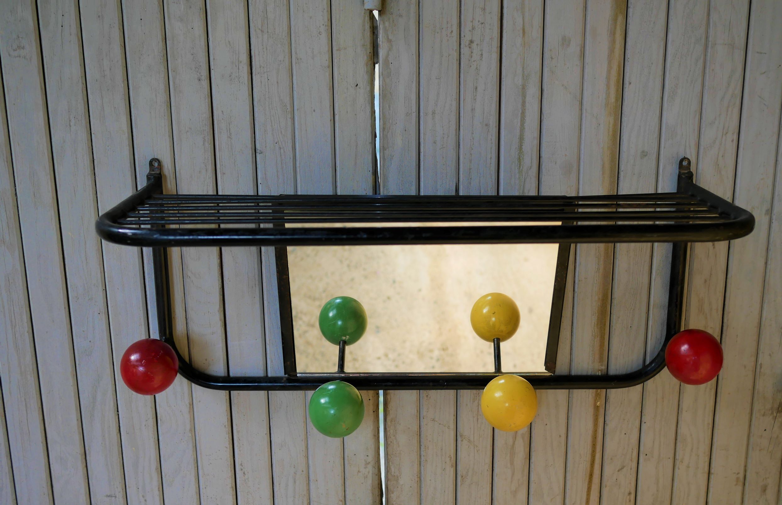 Vintage wall coat holder with 4 coloured balls, mirror and shelf