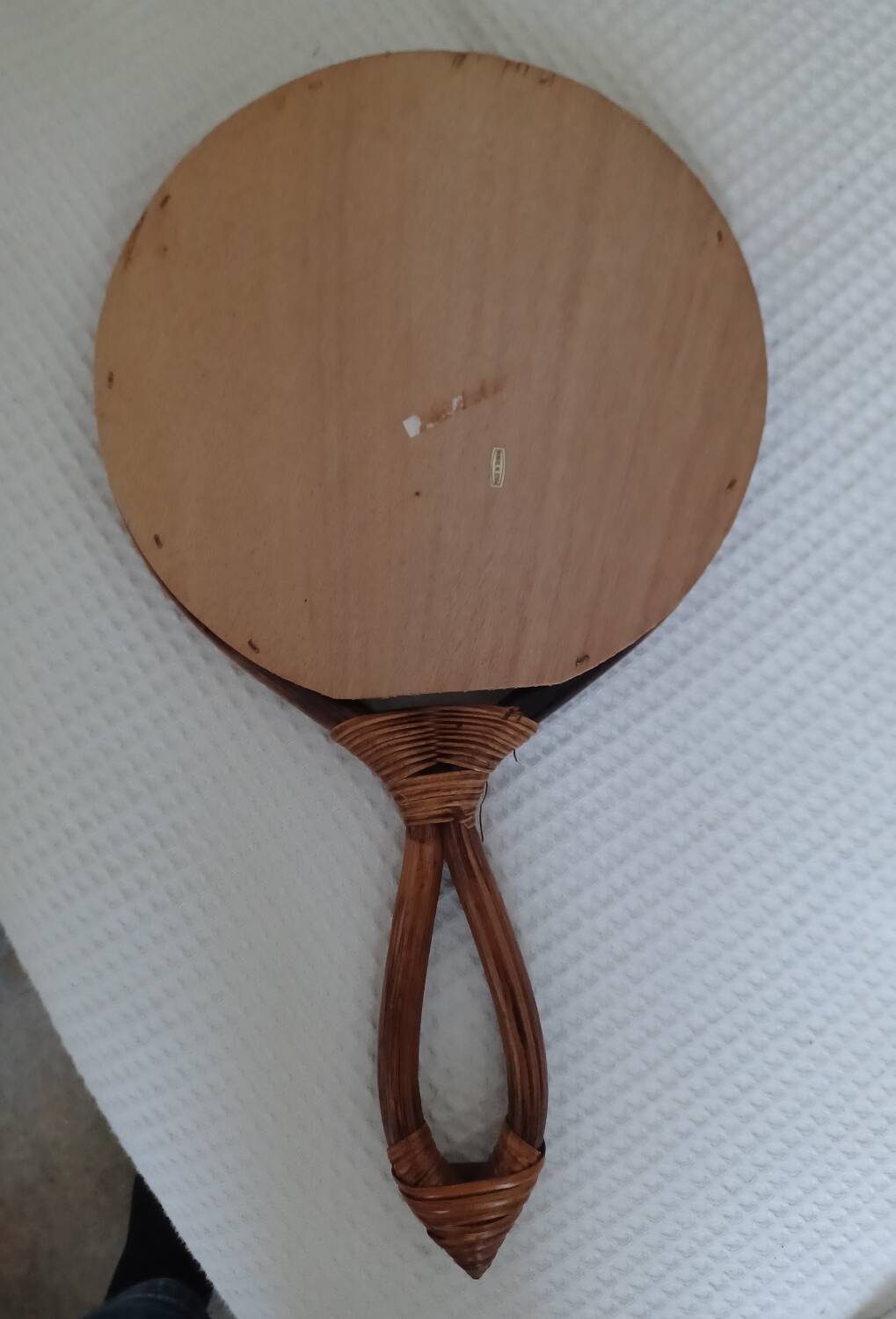 Vintage rattan hand mirror