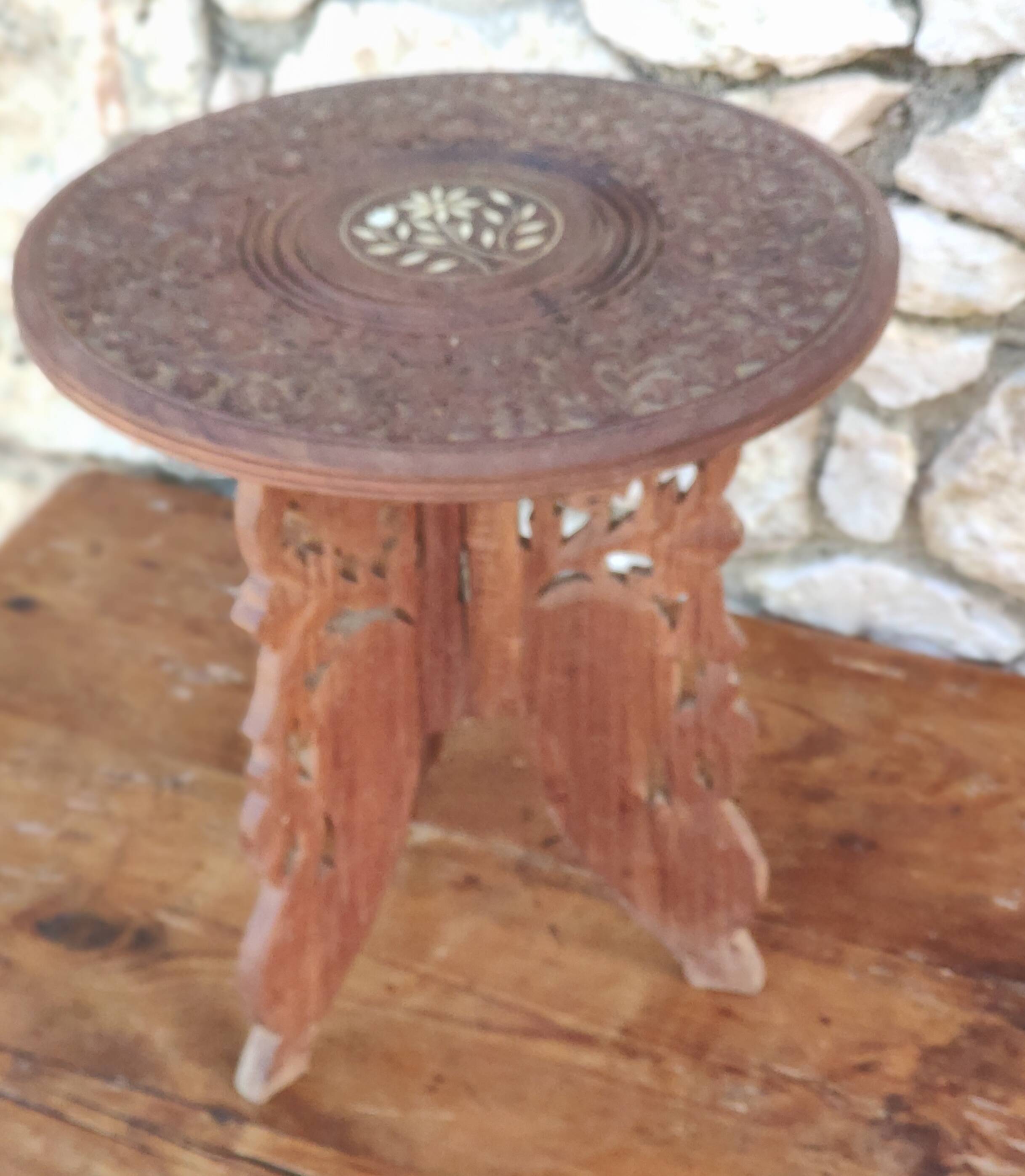 Old small carved wooden table