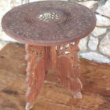 Old small carved wooden table