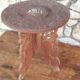 Old small carved wooden table