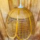 Rattan and cane lampshade in the shape of a flower from the 1970s.