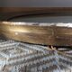 Antique oval gilded stucco mirror