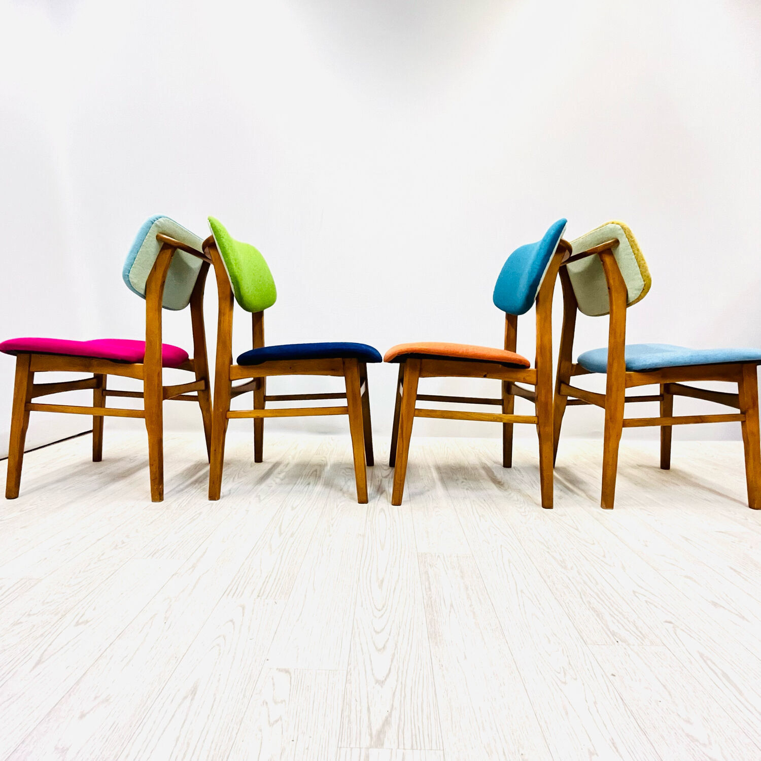 Four middle century chairs