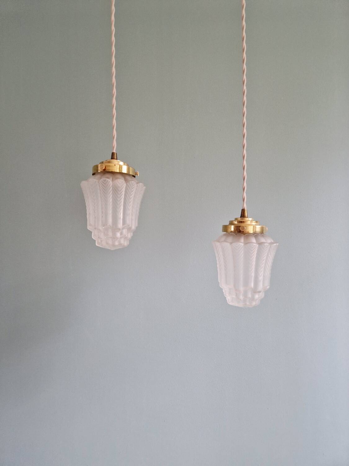 Pair of Art Deco Skyscraper-style pendant lights in frosted glass, 1920-30