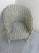 Vintage white rattan children's armchair