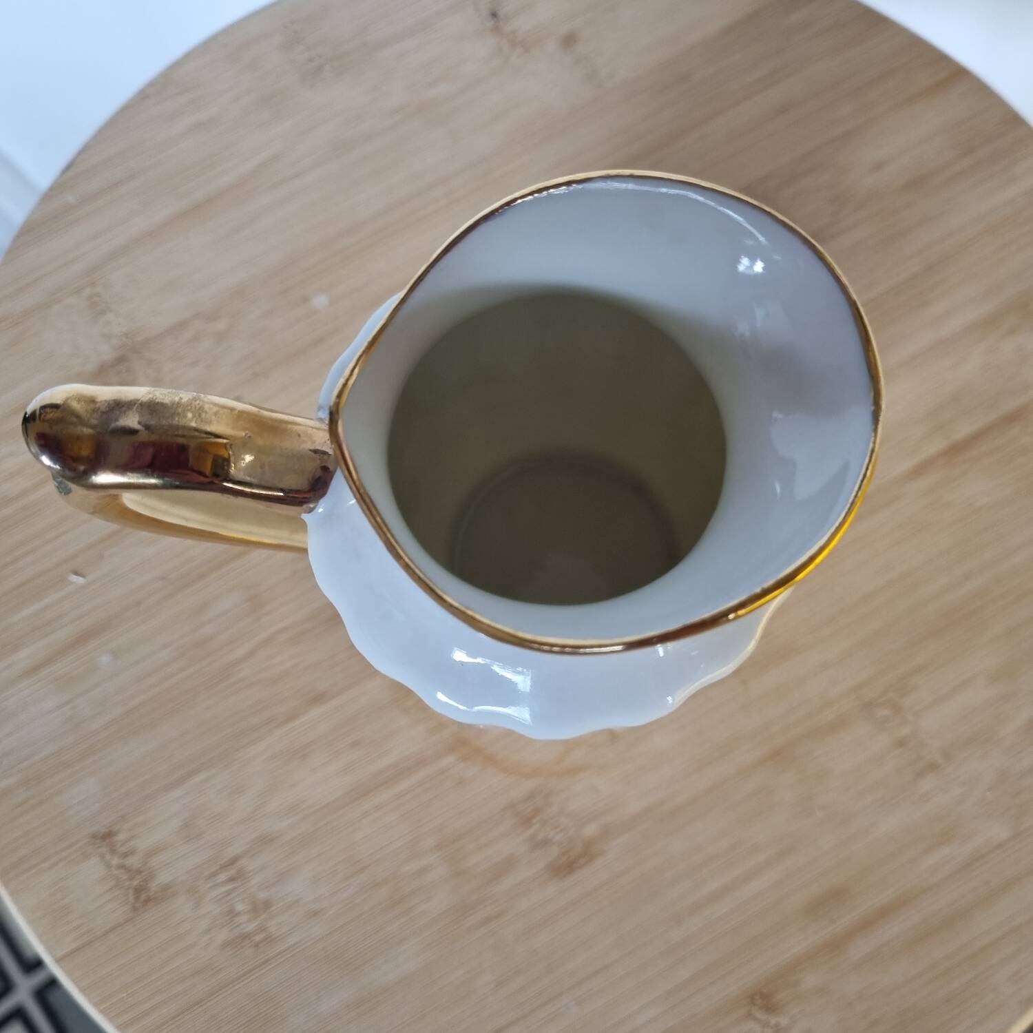 White and gold porcelain milk jug