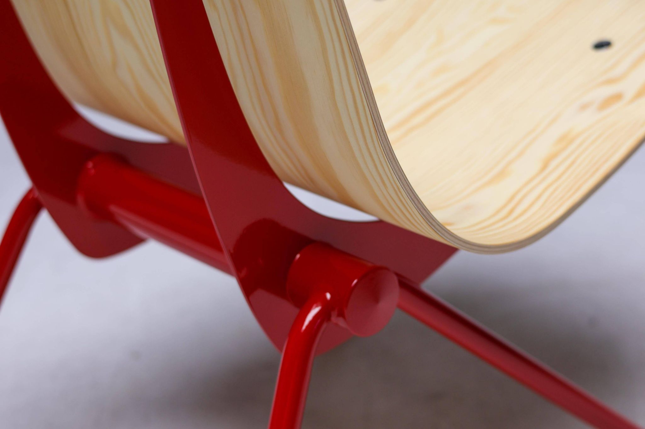 Jean Prouvé "Antoni" chair - Limited edition, red frame / plywood seat