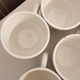 Set of 11 porcelain cups
