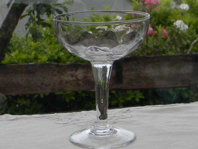 Set of 6 antique glass champagne glasses.