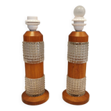 Swedish table lamps made of teak wood and hard pressed crystal glass.