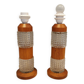 Swedish table lamps made of teak wood and hard pressed crystal glass.