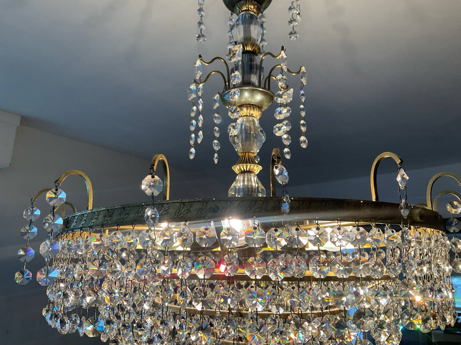 Brass chandelier with crystal pendants