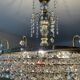 Brass chandelier with crystal pendants