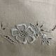 Antique embroidered linen with a floral motif