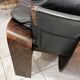 Paire de fauteuils scandinaves en cuir et palissandre